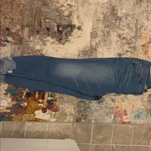 Stretch denim raw hem